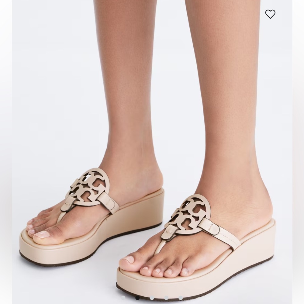 Tory Burch  MILLER WEDGE SANDAL
$275 size 9.5 gently used
Color: Soft Pink